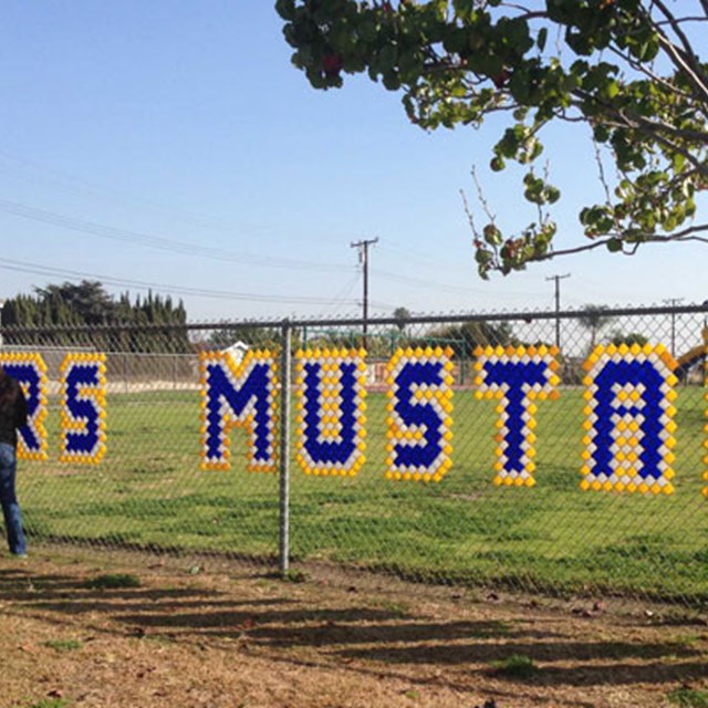 Faculty crafting the Enders sign. Let's go Mustangs!